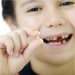 Mother sifting through feces to find child’s swallowed lost tooth insists she is not a moron.